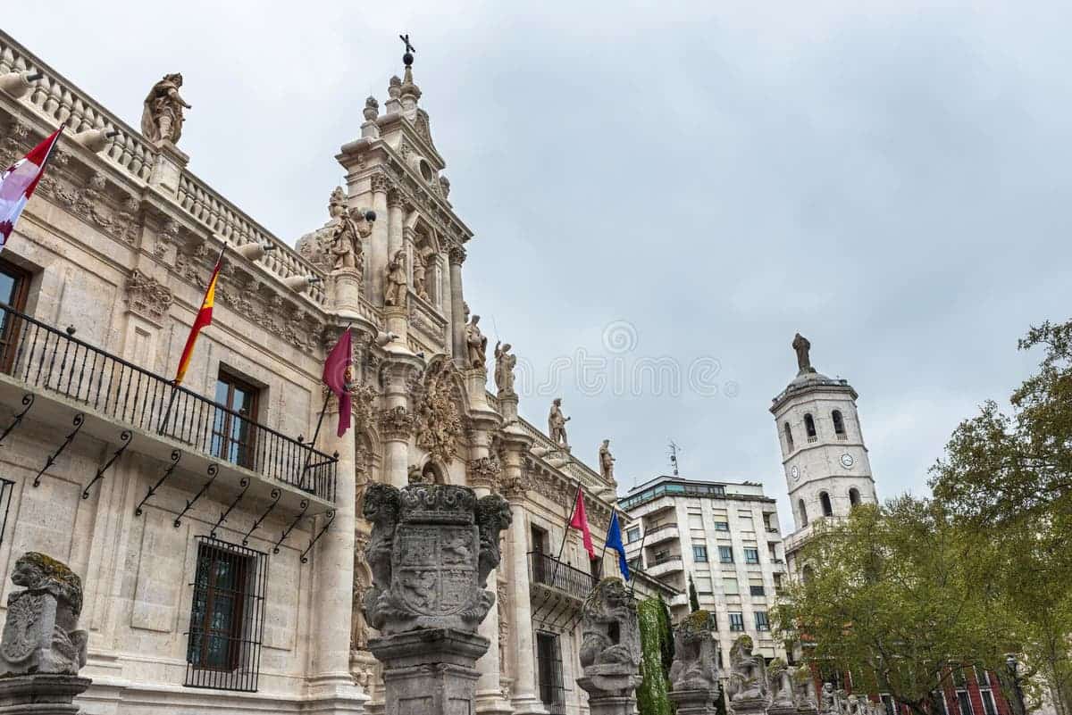 University of Valladolid – Historic University in Spain Historic facade of the University of Valladolid in Spain with intricate stone architecture and sunny courtyard.