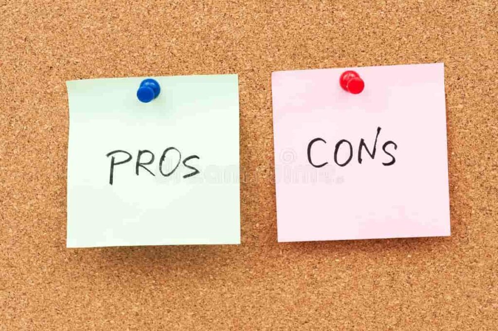 Pros and Cons sticky notes pinned on a corkboard