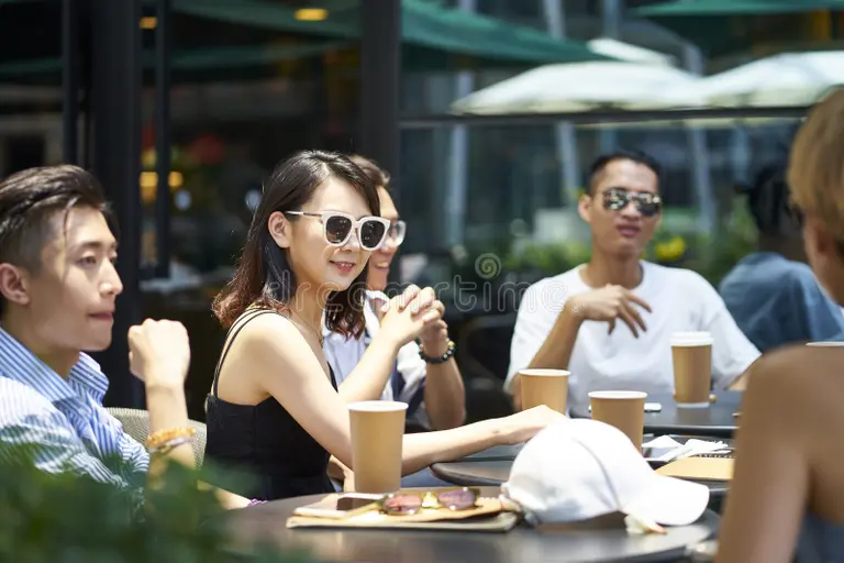 Students at an outdoor campus café in Singapore—student life, culture and safety tips for Study in Singapore.