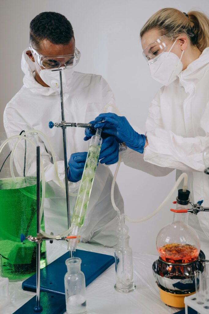 Students conducting sustainability and green technology experiments in a UAE university laboratory