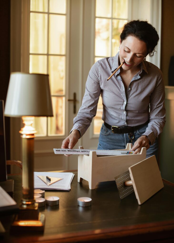 Pros and cons of studying in Germany illustrated by a student planning and organizing study documents