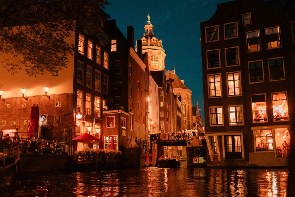 Night view of Amsterdam canals symbolizing higher studies in the Netherlands