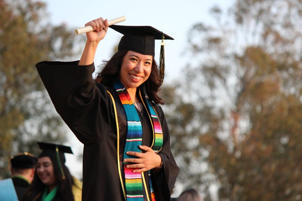 International student celebrating graduation as global education partnerships expand