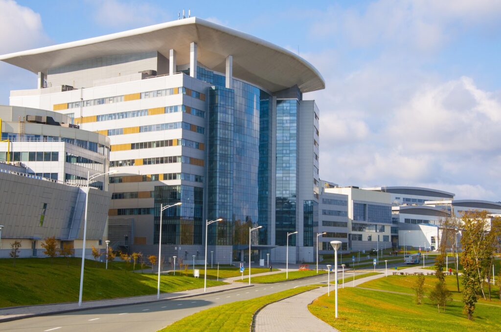 Group of international students holding a world globe representing study abroad opportunities