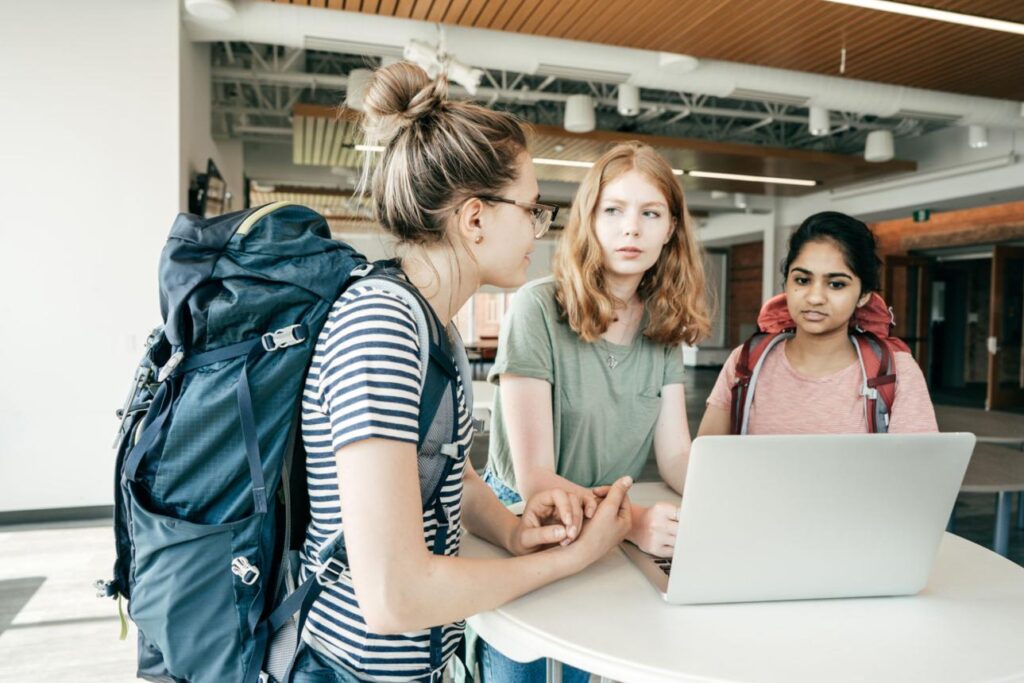 calculate ROI to find the best country study abroad for maximum returns with students planning on laptop