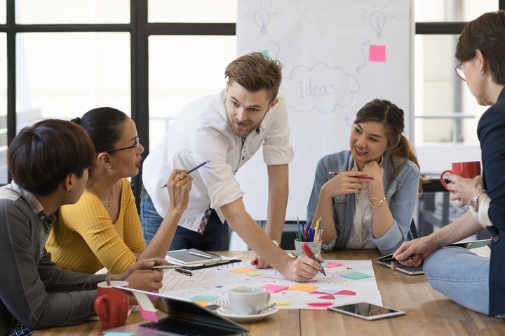 Top Countries Offering the Best Work Opportunities After Study Abroad showing professionals handshake and career success abroad