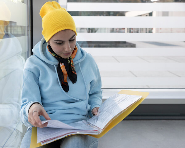 Study in Austria student reviewing admission documents and preparing for university application in Austria.
