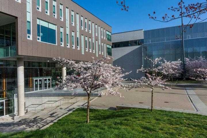 Study in Canada modern university campus featuring contemporary academic buildings, green landscape, and a welcoming environment for international students.